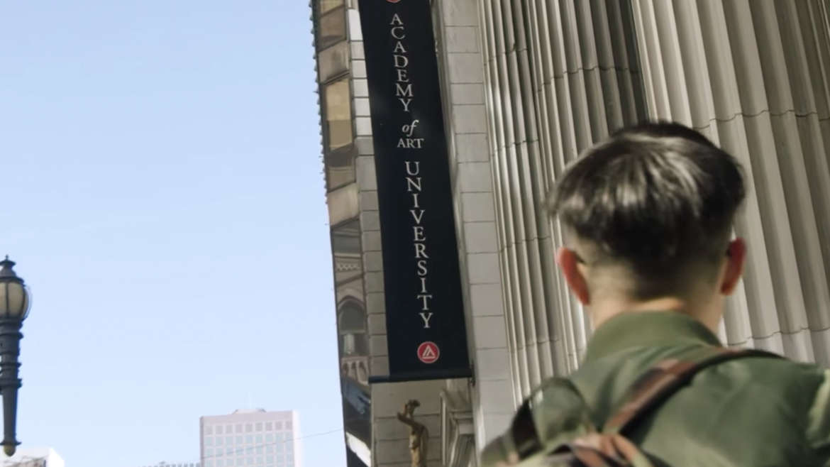 Student Looking at Academy Pillar