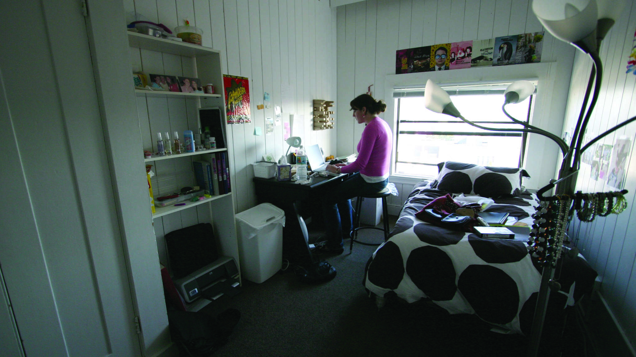 Girl on Computer Inside Bedroom