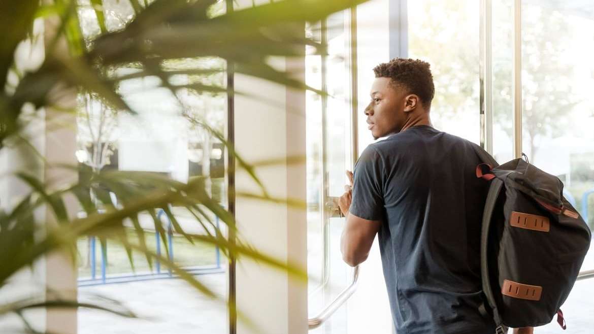 Male Student Heading Out