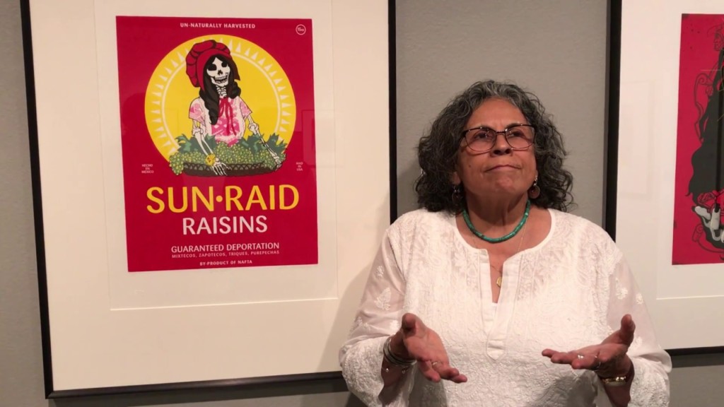 Ester Hernandez with her Sunraid artwork