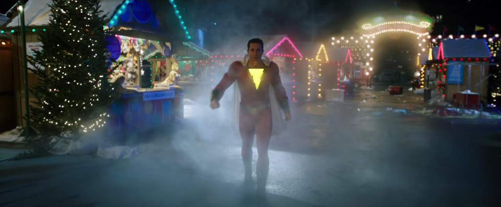 Shazam walking through fog at a carnival