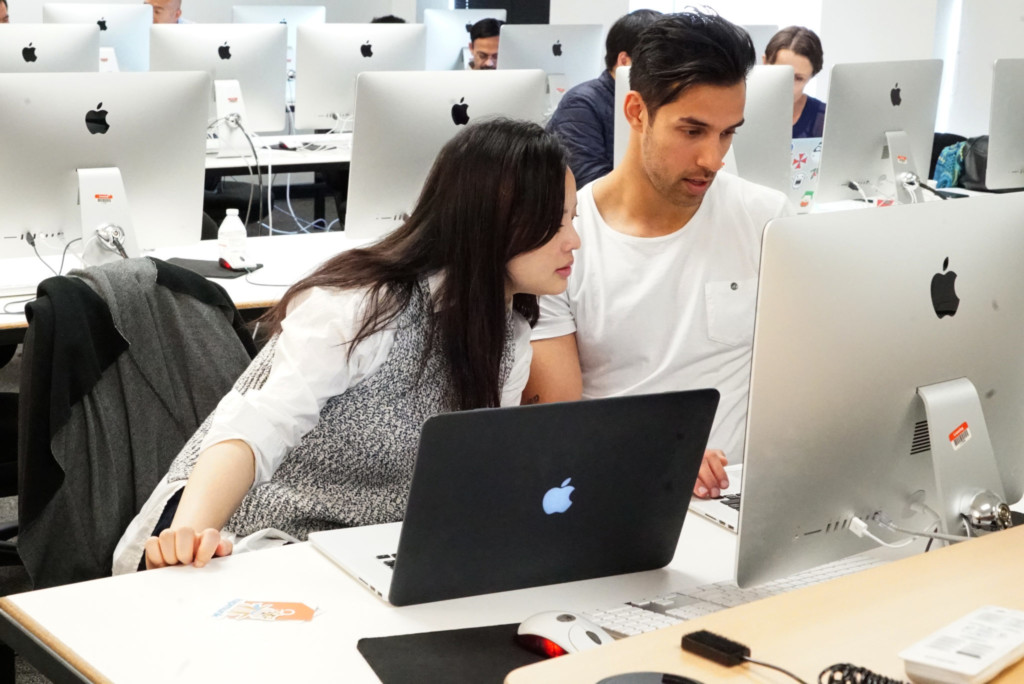 Students Looking for Grants and Scholarships on a Computer