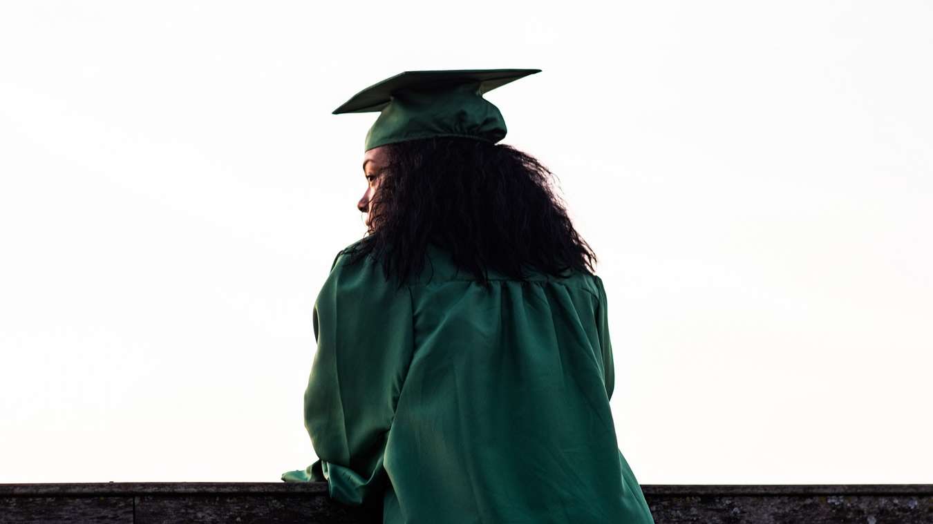 graduating student in toga