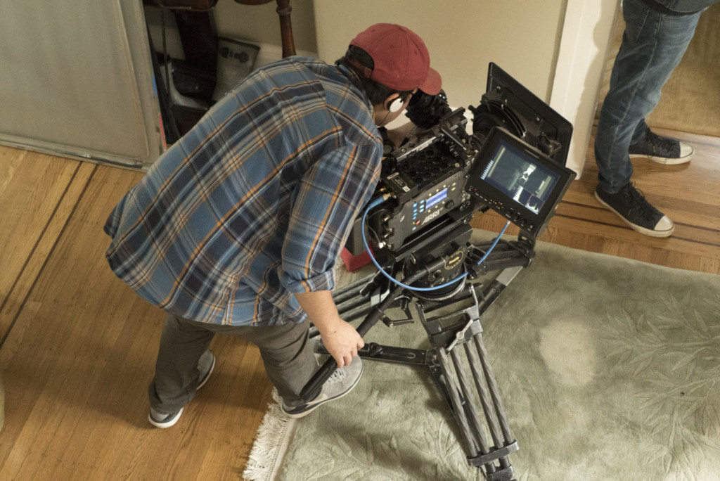 Motion Pictures student behind camera