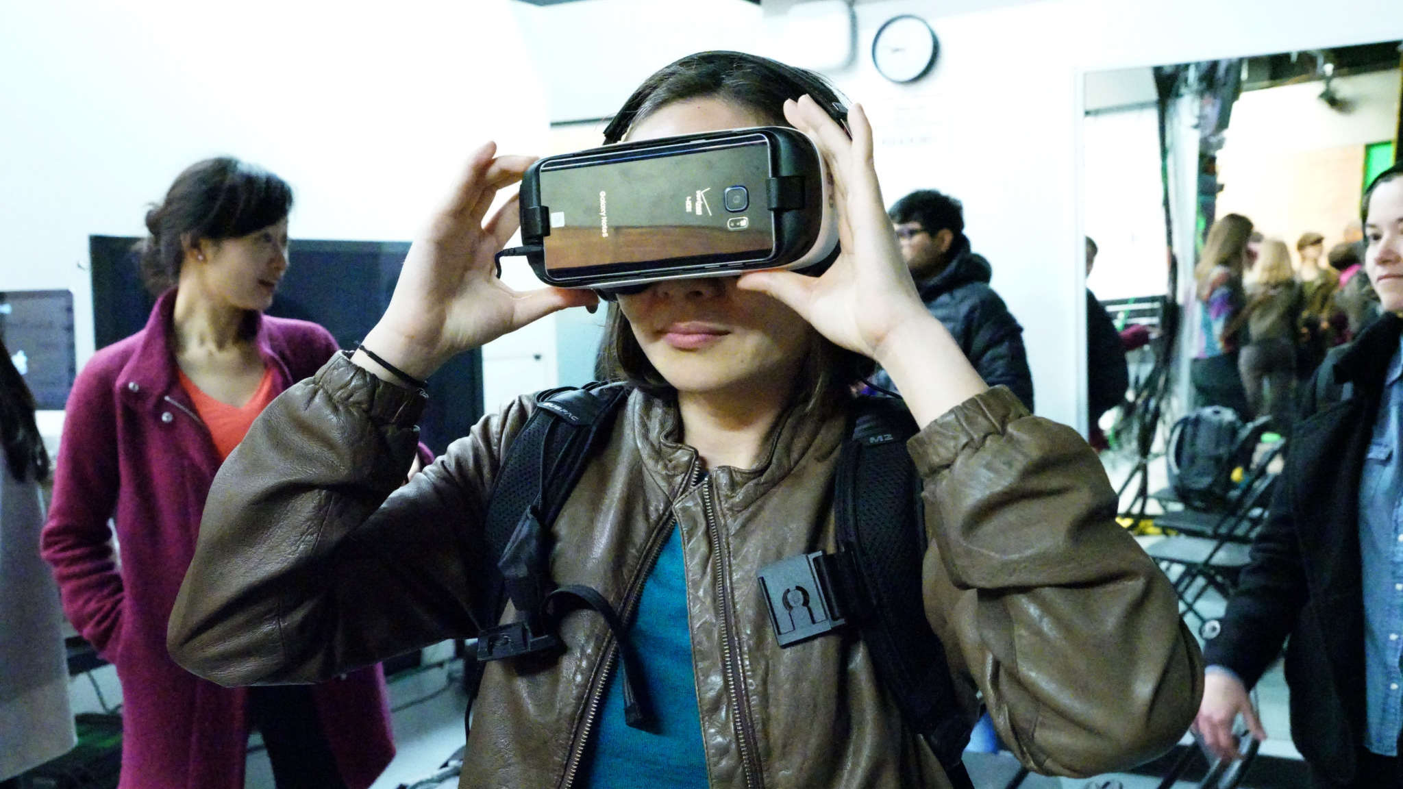 Student wearing virtual reality headset at a campus event