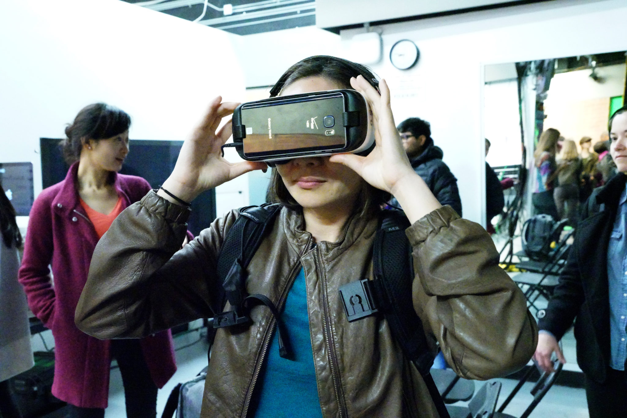Student wearing virtual reality headset at a campus event