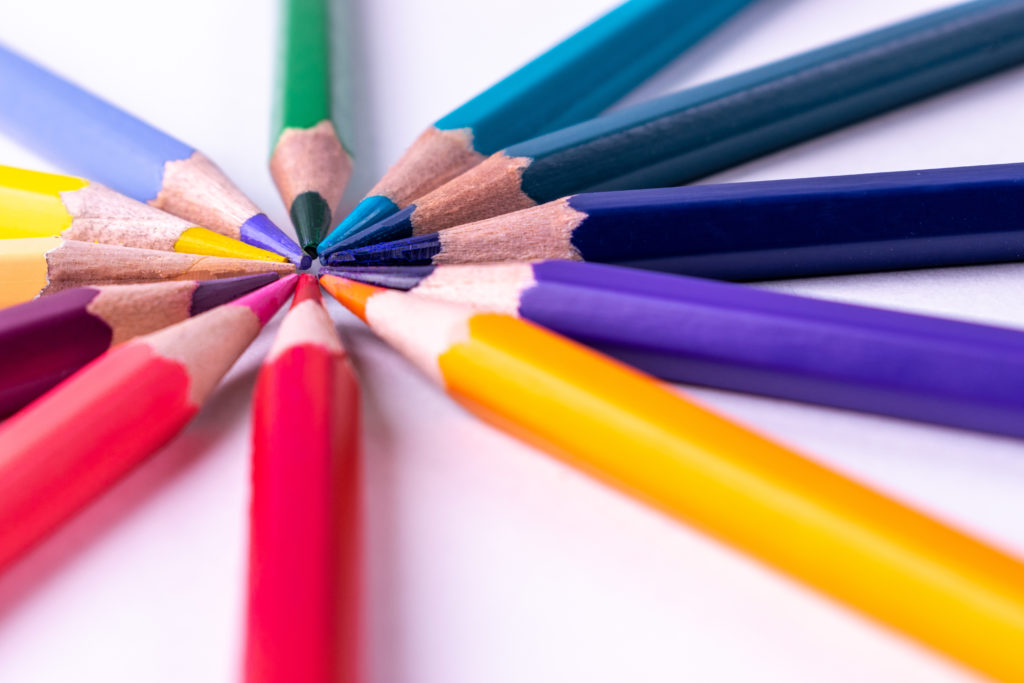 Sharpened colored pencils in a circle touching at the top