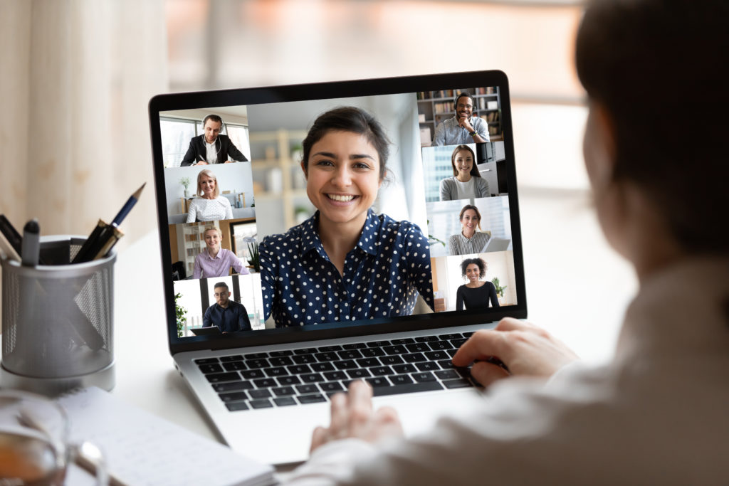 Women sitting in front of her laptop on a web conference