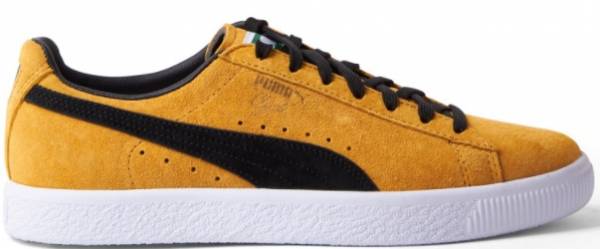 Gold and black Puma Clyde sneaker
